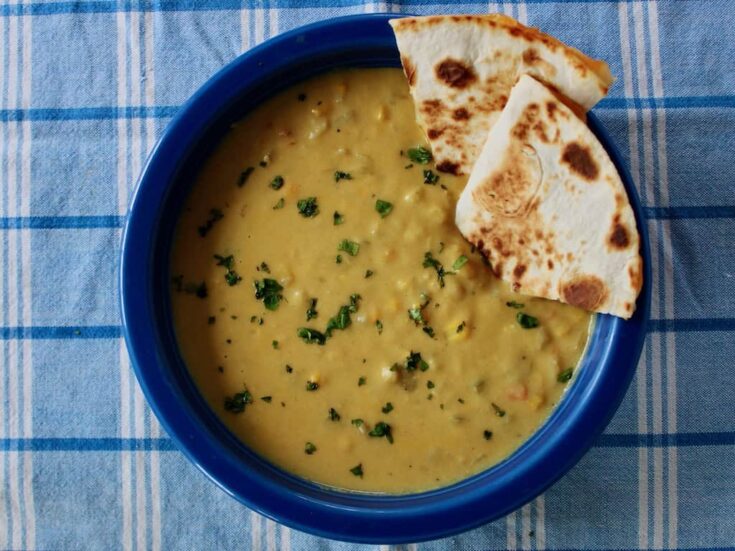 Bowl of corn chowder with quesadillas